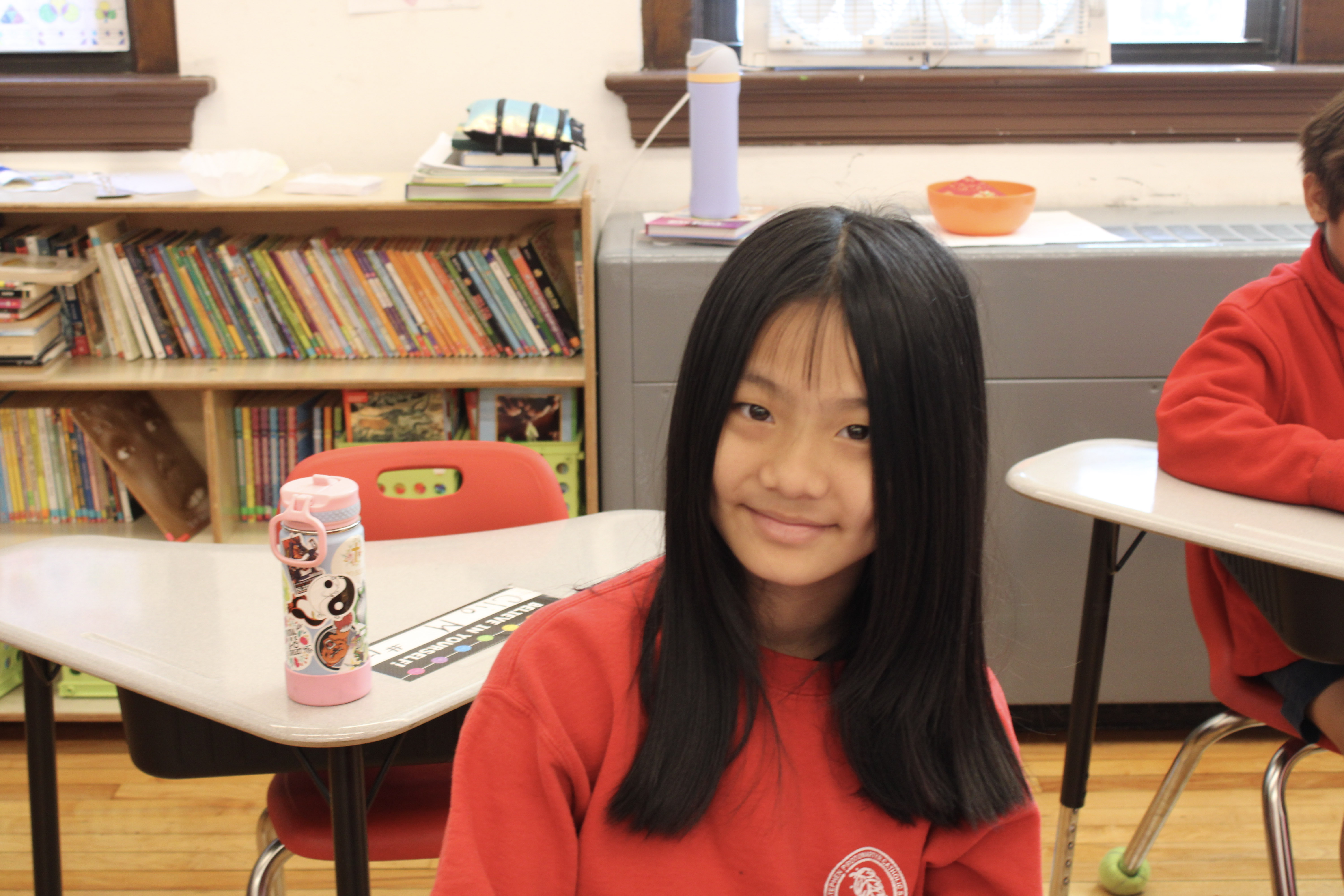 Young student smiling at camera