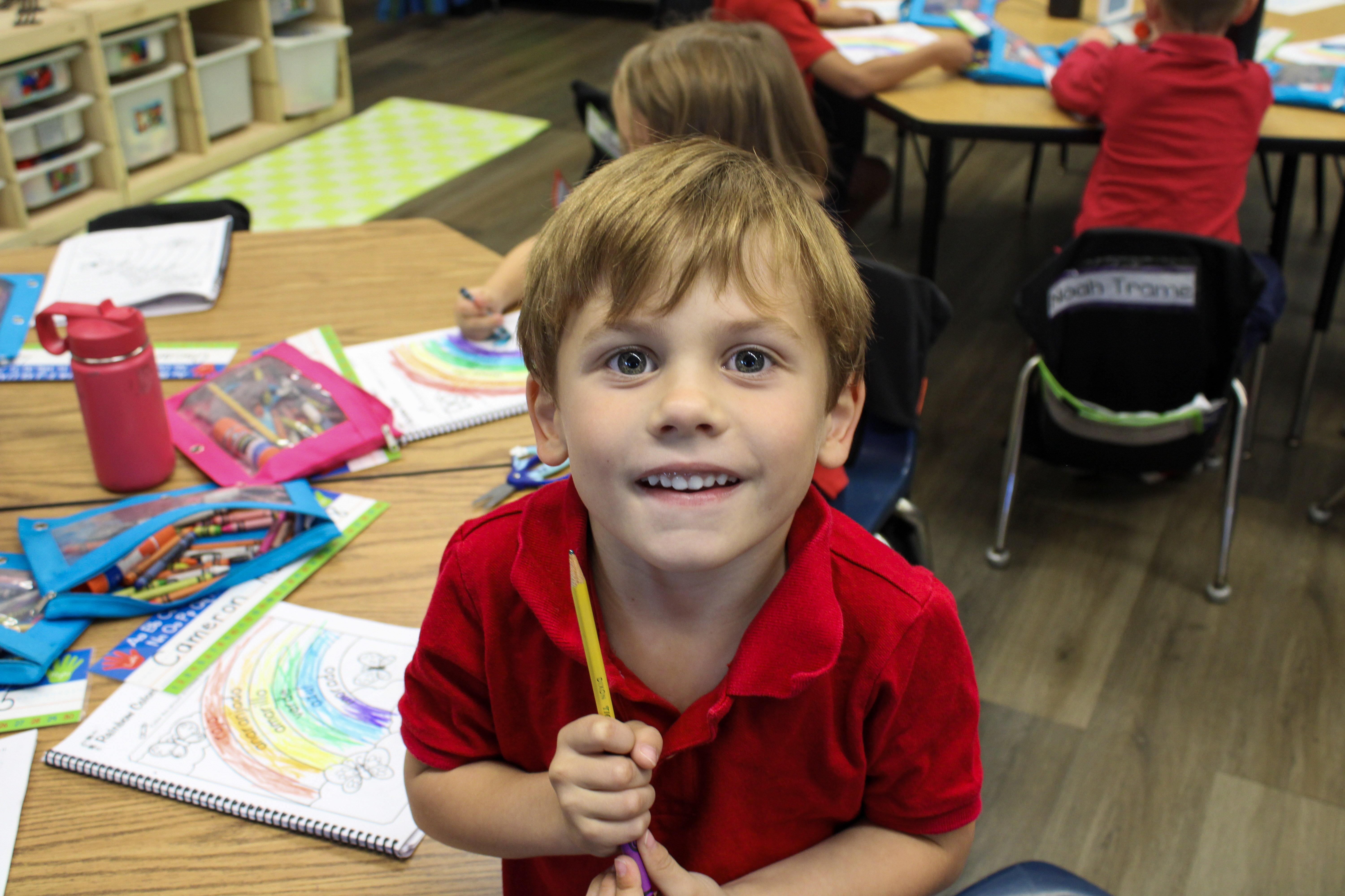 Charismatic young student facing camera