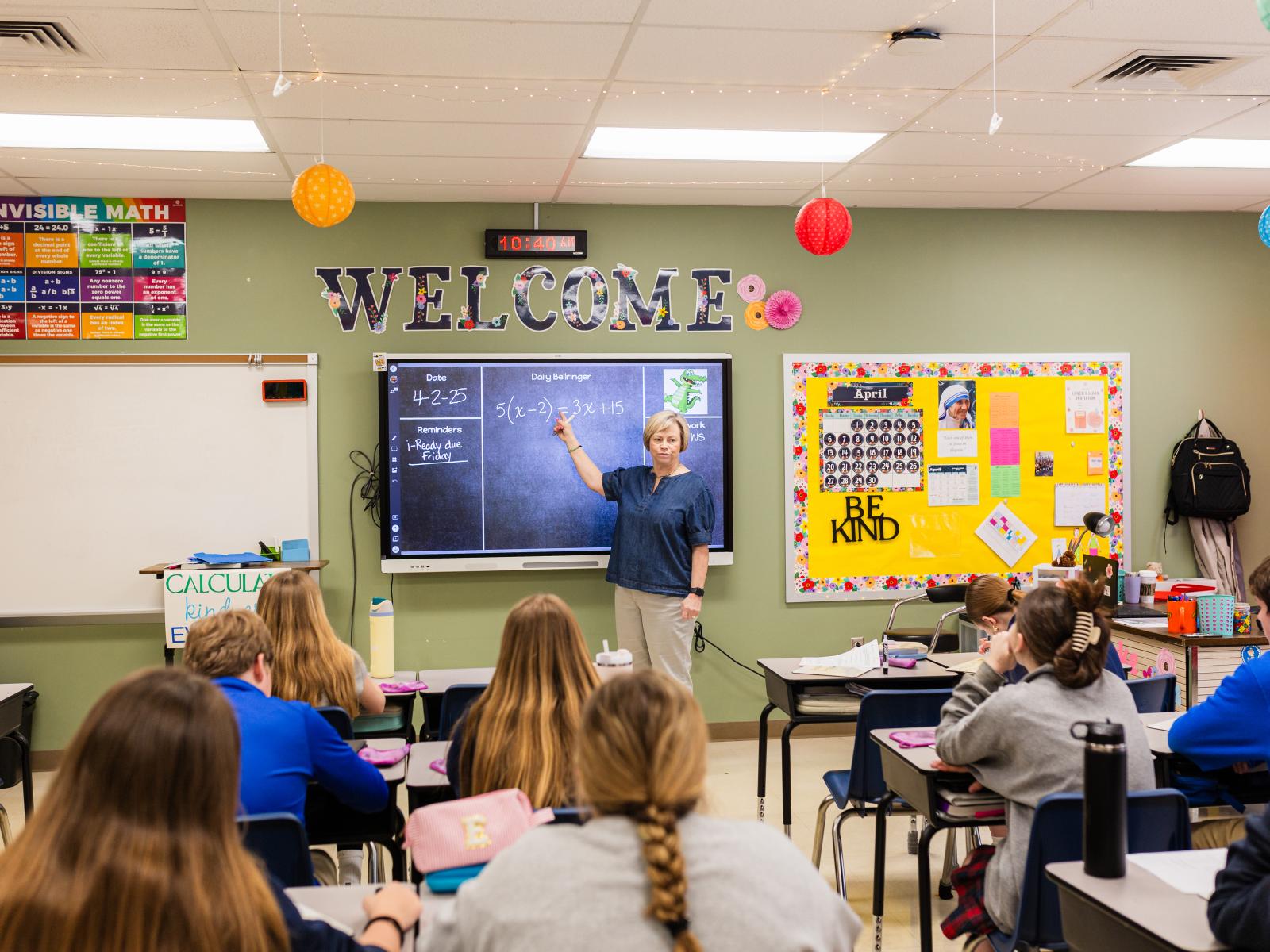 Teacher teaching students