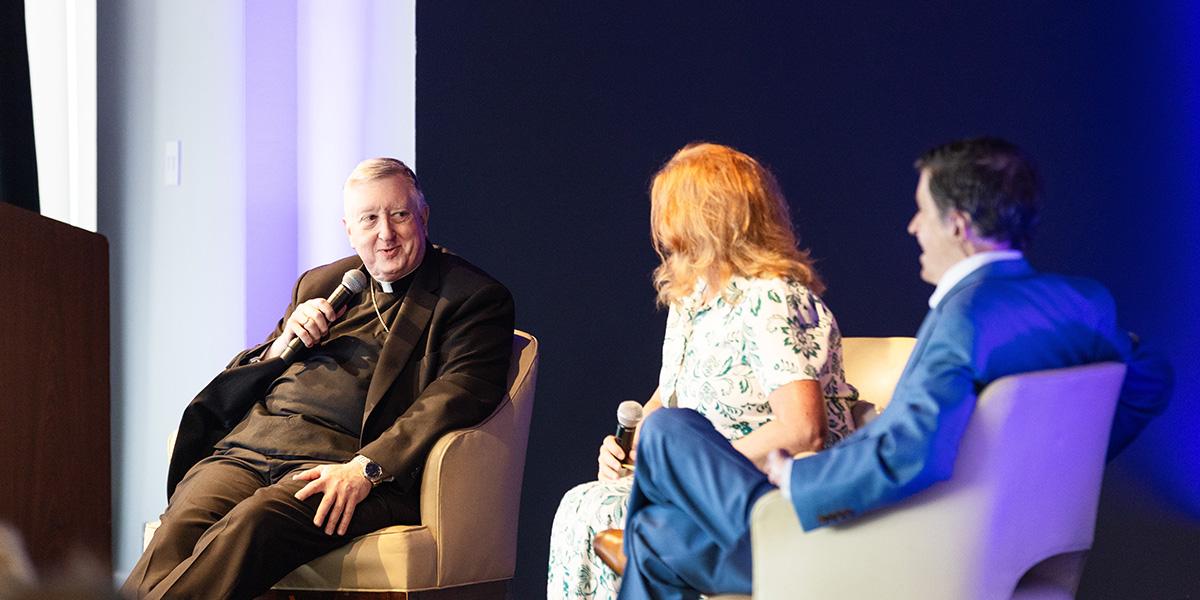 Archbishop joins Julie Soffner, and John O' Leary for a panel during the leadership comissioning