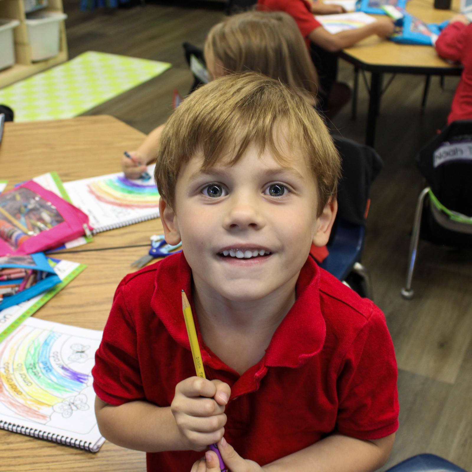 Charismatic young student facing camera
